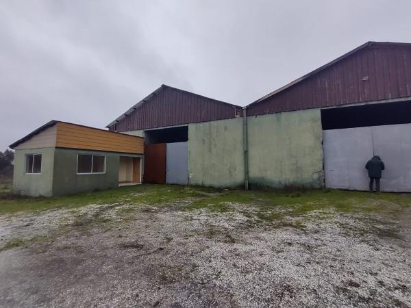 VENTA DE SITIO CON DOS GALPONES 