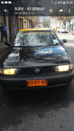 CHOFER TAXI A CARGO NISSAN V16