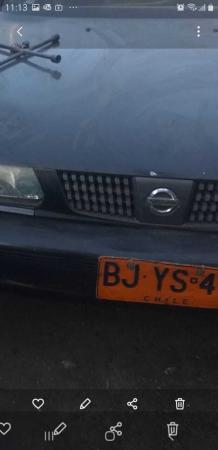 TAXI NISSAN V16 2009