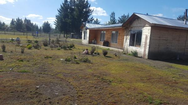 VENTA PARCELA  1 HECTAREA, CON DOS CASAS PREFABRIC