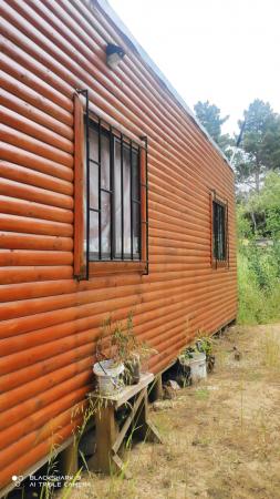 VENDO TERRENO CON DOS CABAÑAS ROL PROPIO 