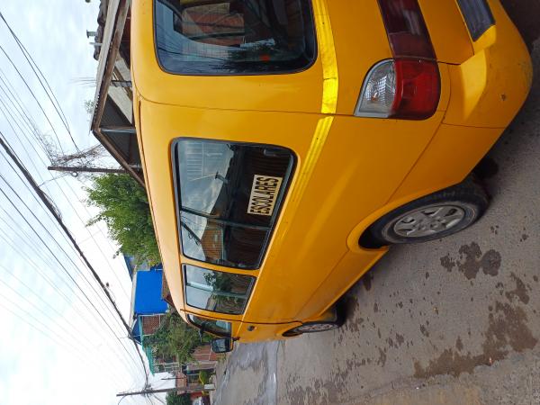 VENDO FURGON ESCOLAR KIA BESTA 2.7  2005