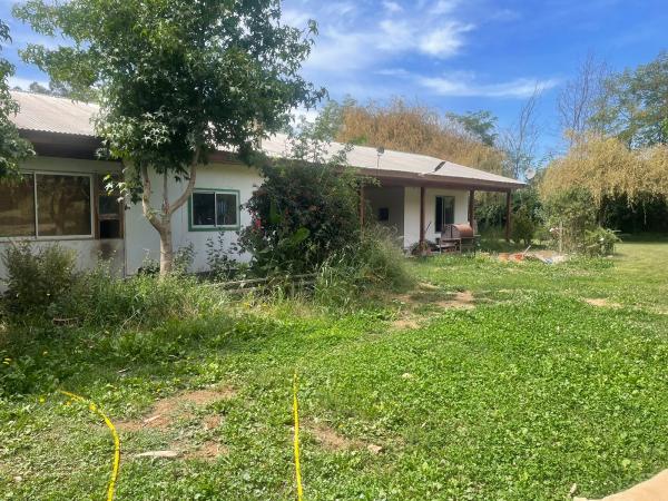 VENDO PARCELA CON CASA DE 1/2 HA