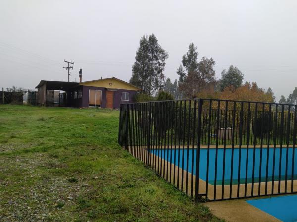 VENDO PARCELA CON CASA 