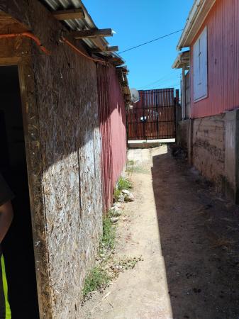 VENDO SITIO URBANIZADO Y CONSTRUCCION