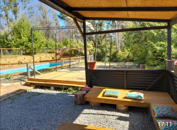 VENDO PARCELA CON PISCINA 